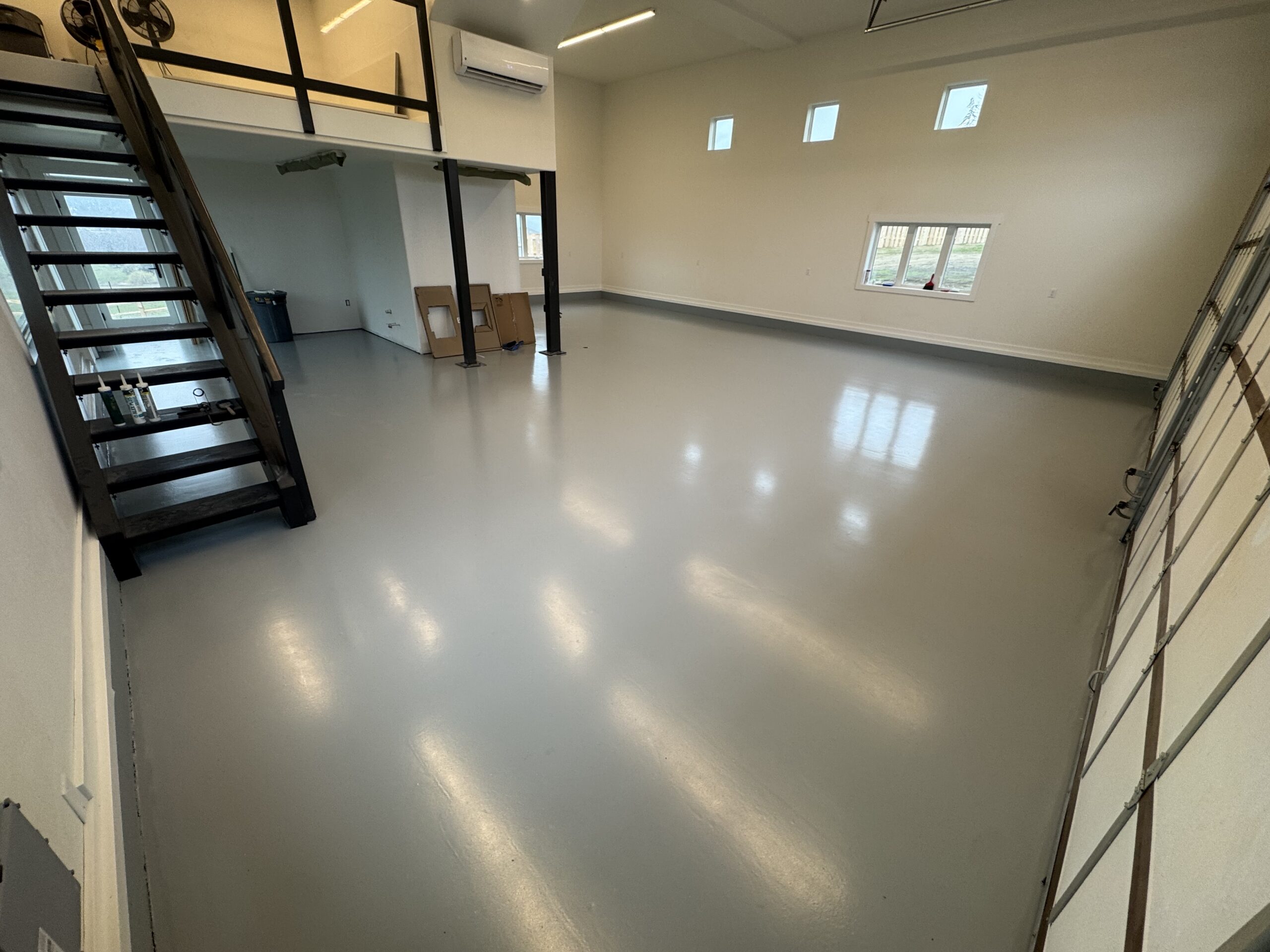 Smooth gray coating in a spacious residential garage