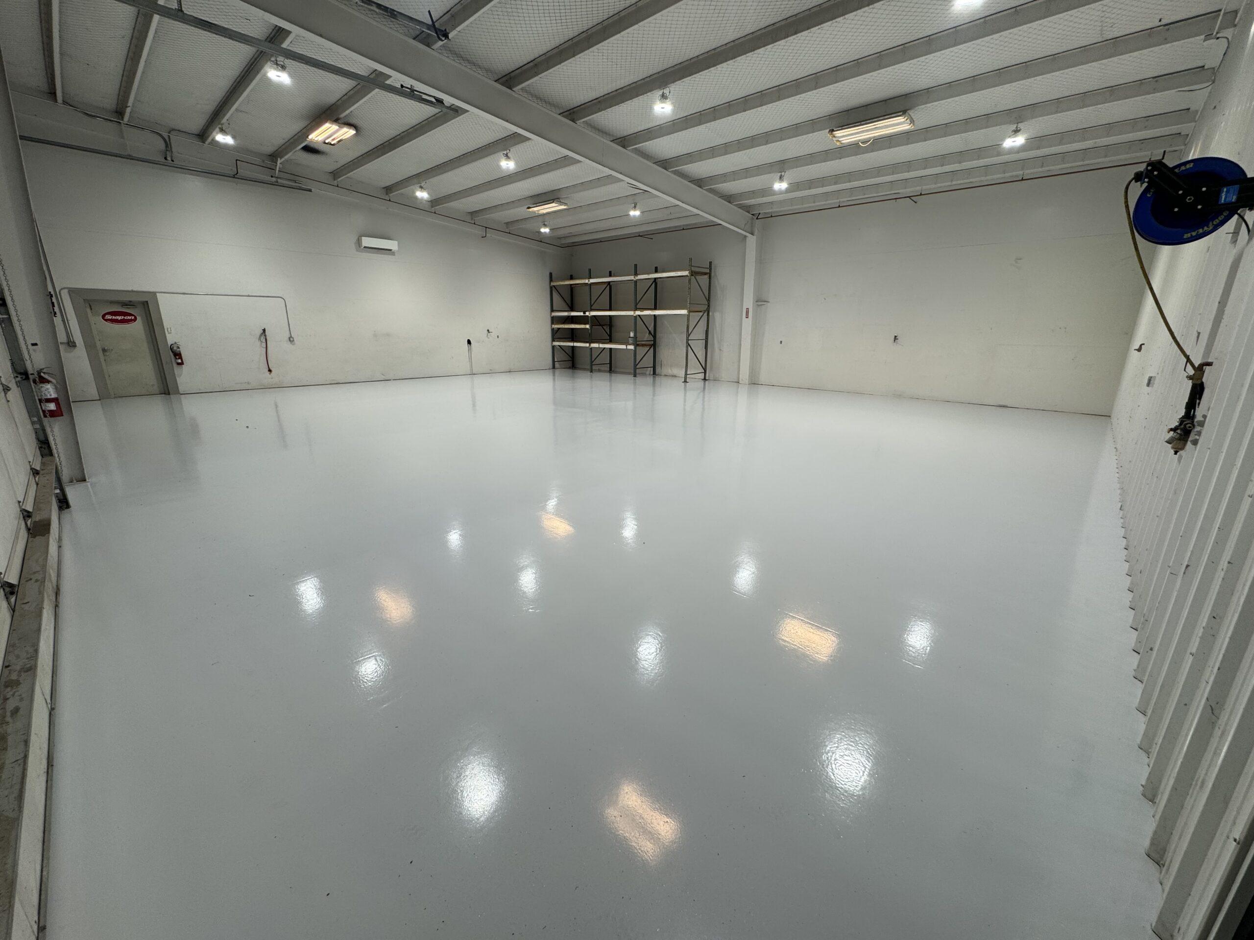 Clean finished concrete coating in a large garage
